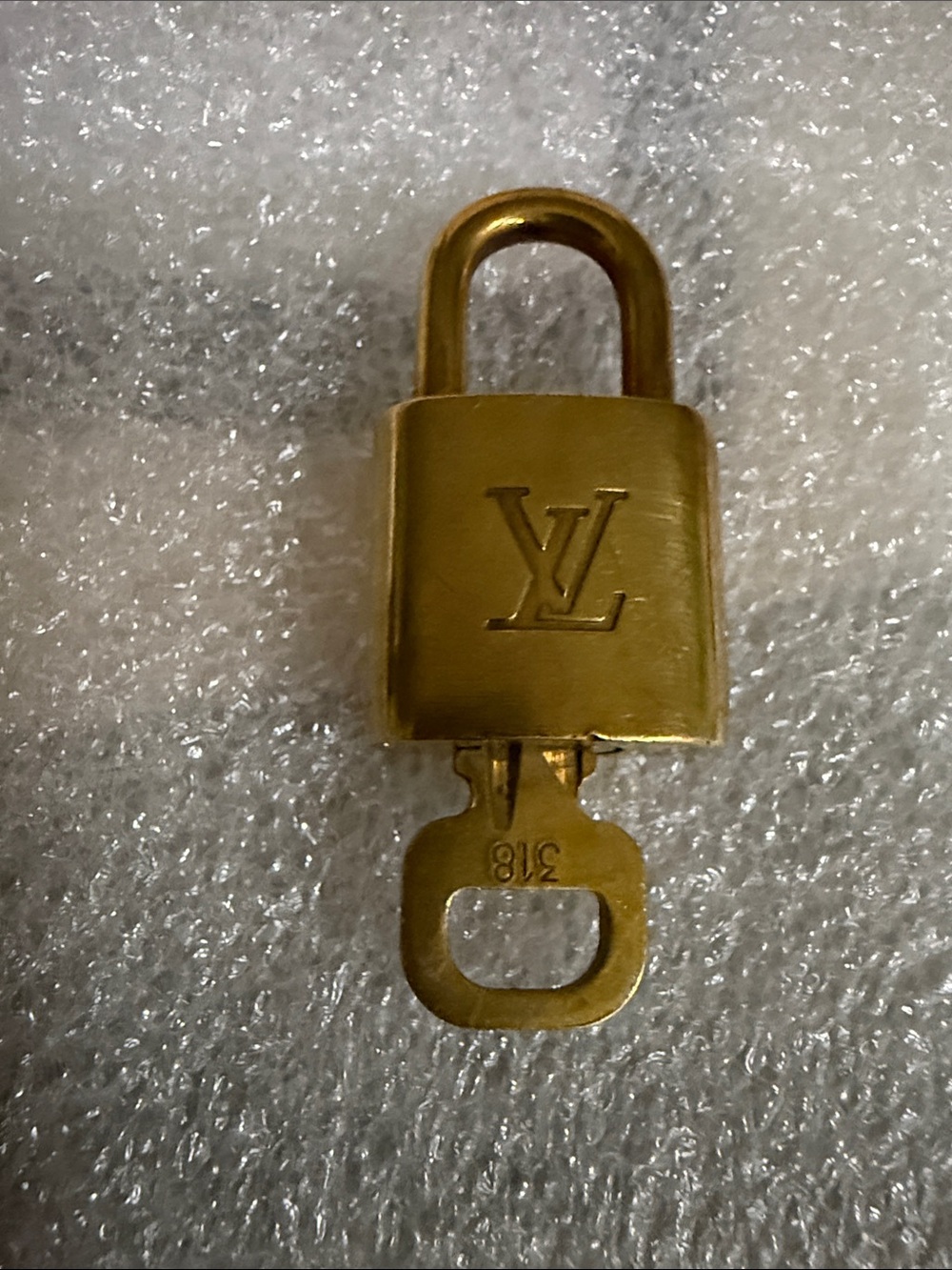 Louis Vuitton Gold Padlock and Key Set